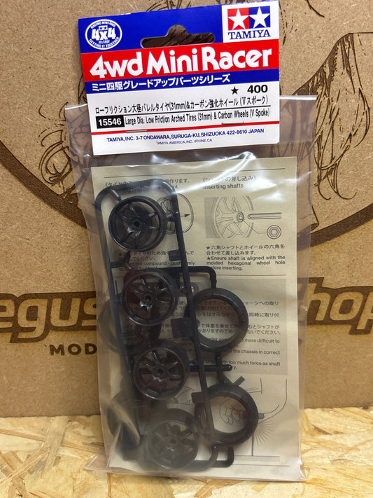 Tamiya Large Dia. Low Friction Arched Tires (31mm) & Carbon Wheels (5 Spoke) – Cod. 15546 - immagine prodotto